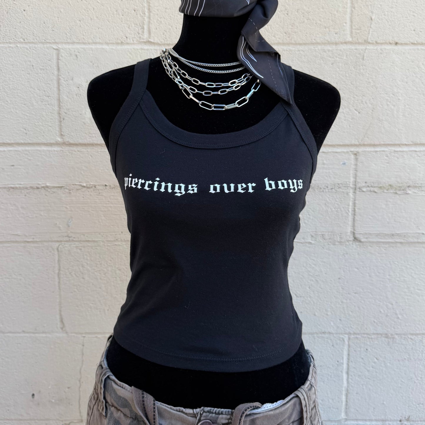 Piercings Over Boys Tank